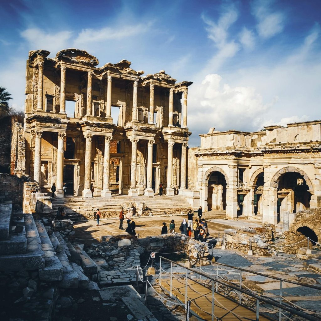pexels-photo-14575904-14575904 Explore the ancient ruins of the Library of Celsus under a clear blue sky in Ephesus, Turkey.