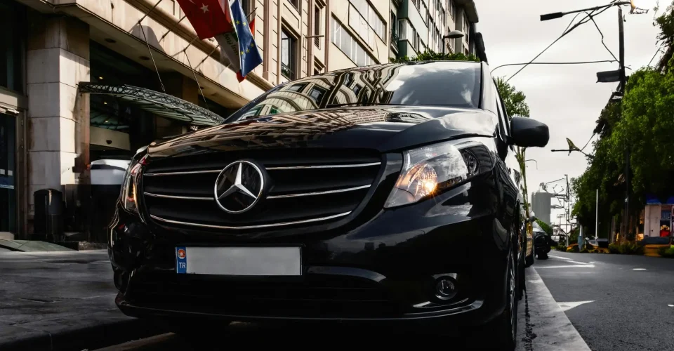 pexels-photo-17455625-17455625 Luxury black Mercedes-Benz Vito parked on a Turkish city street, capturing urban elegance.