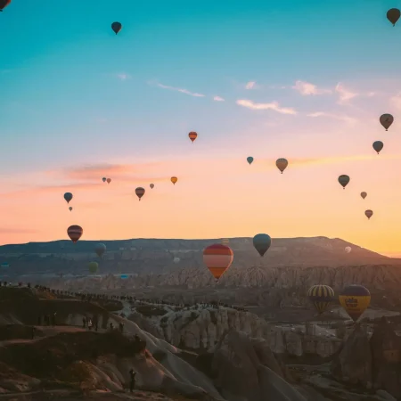pexels-photo-3889704-3889704 Colorful hot air balloons soaring over Cappadocia at sunrise, Turkey.